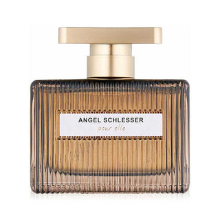 Garrafa de perfume ‘Agua de Perfume AMBAR FEMME’ da Alvarez Gómez, com líquido rosa e tampa dourada, ao lado da sua caixa de embalagem roxa com detalhes do produto.