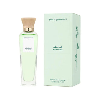 Frasco de perfume ‘AZAHAR AGUAFRESCA’ 120ml da ADOLFO DOMINGUEZ, com líquido verde claro e fita verde, ao lado da sua caixa de embalagem verde com padrões florais.